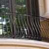 Custom metal balcony railing using our F11-4-14 curved picket as the primary element