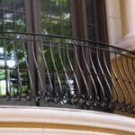 Custom metal balcony railing using our F11-4-14 curved picket as the primary element